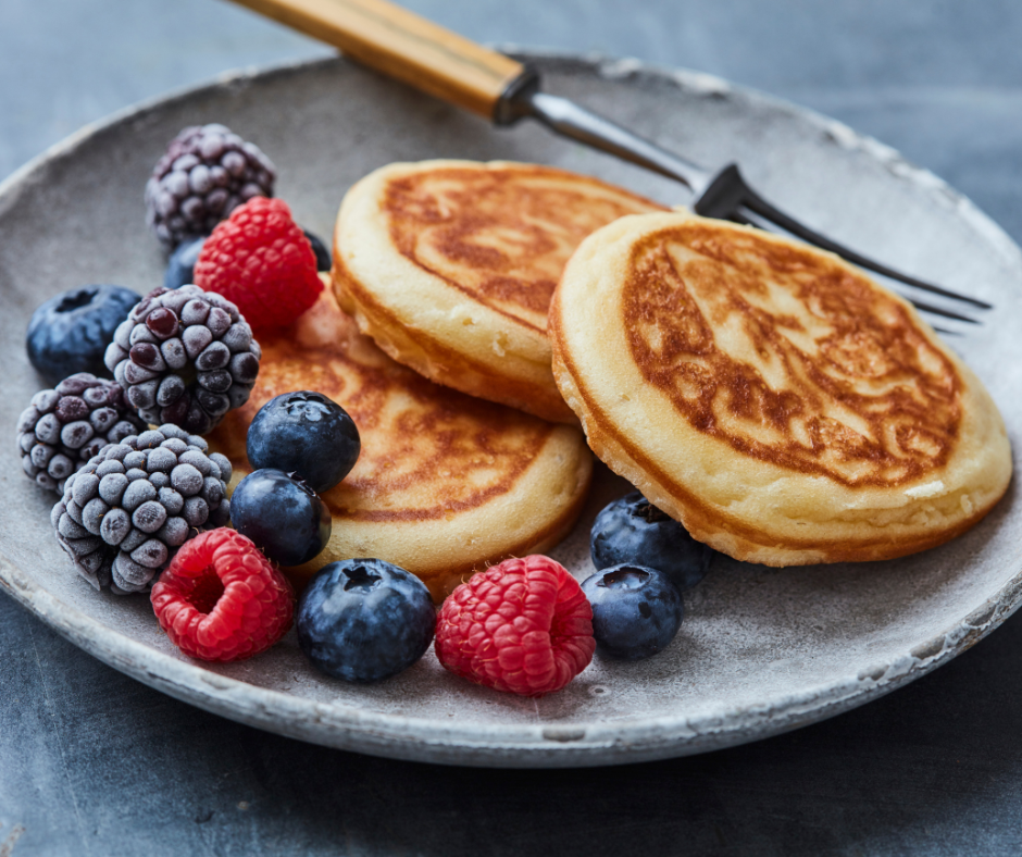 Stack the pancakes on a plate, top with fresh fruit, and drizzle with homemade syrup. Serve warm and enjoy every delicious morsel. 