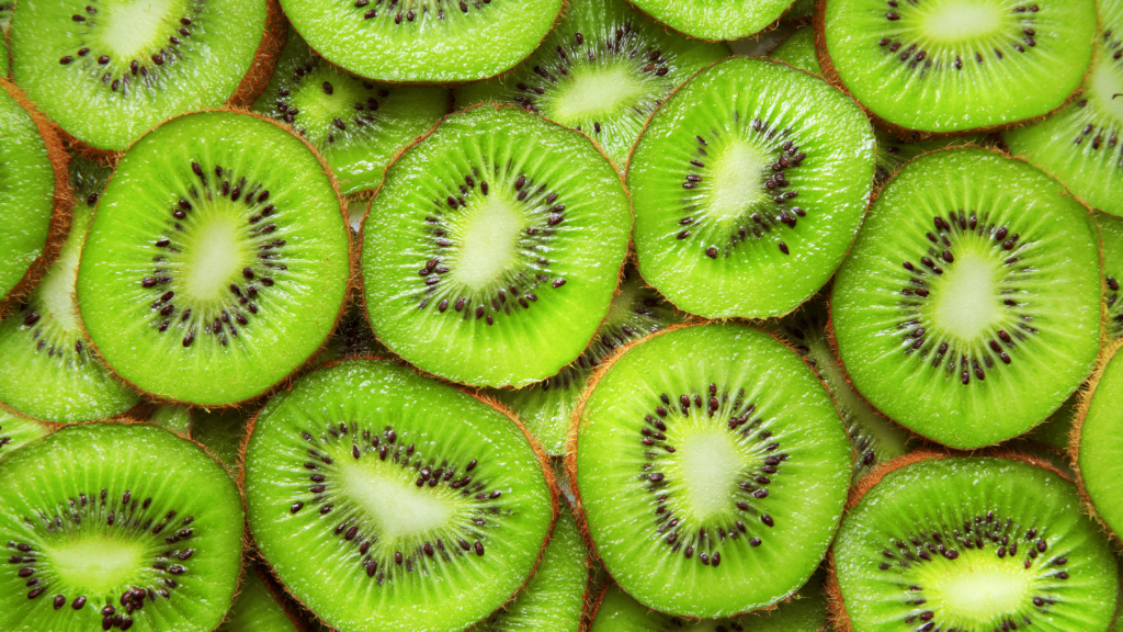 Don’t be fooled by its petite, fuzzy appearance—kiwi is loaded with vitamin C, boasting even higher levels than oranges! According to a study published in the Journal of the American College of Nutrition, vitamin C supports collagen production, which keeps your skin plump, firm, and resilient.